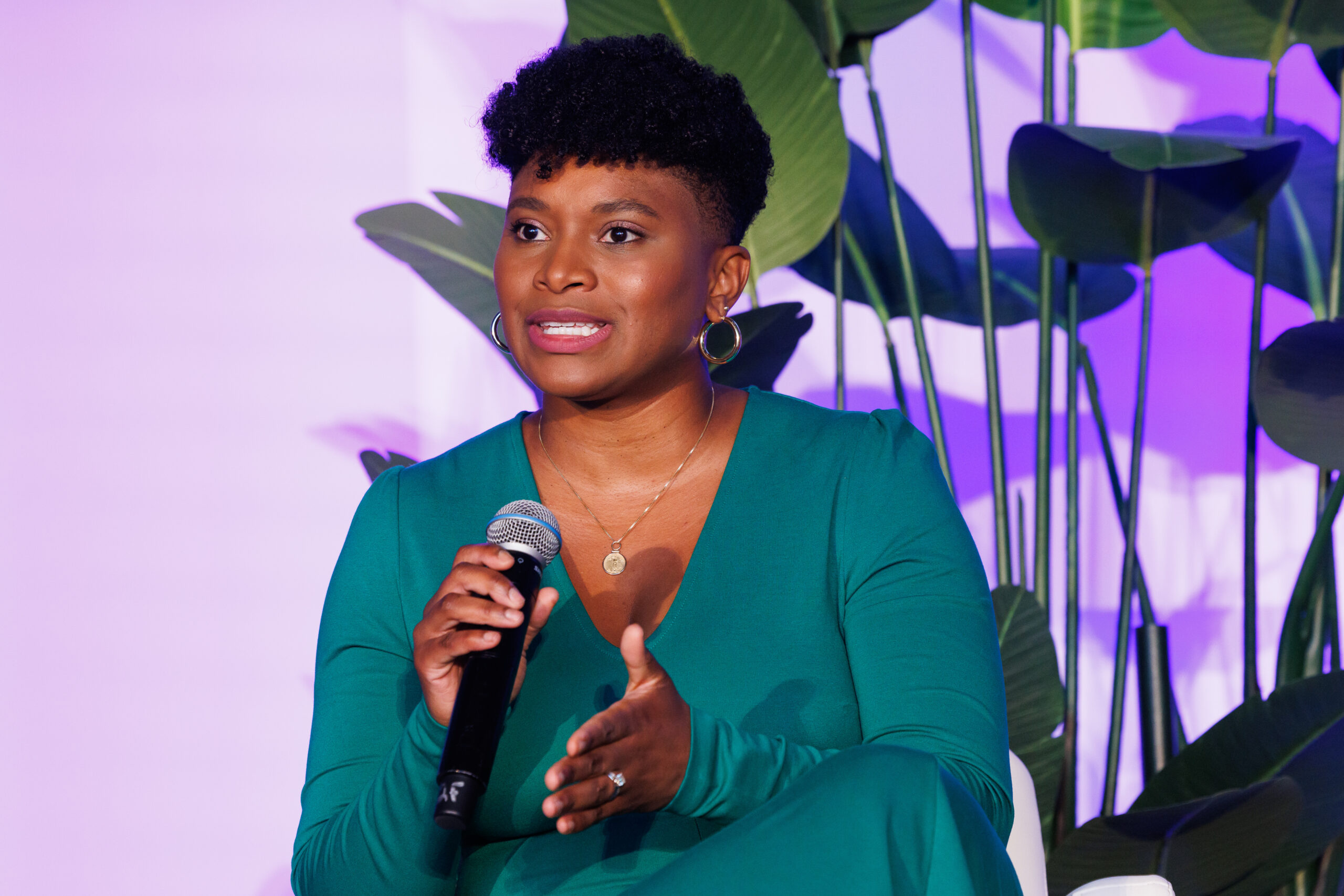 Jonay Holkins speaking on stage